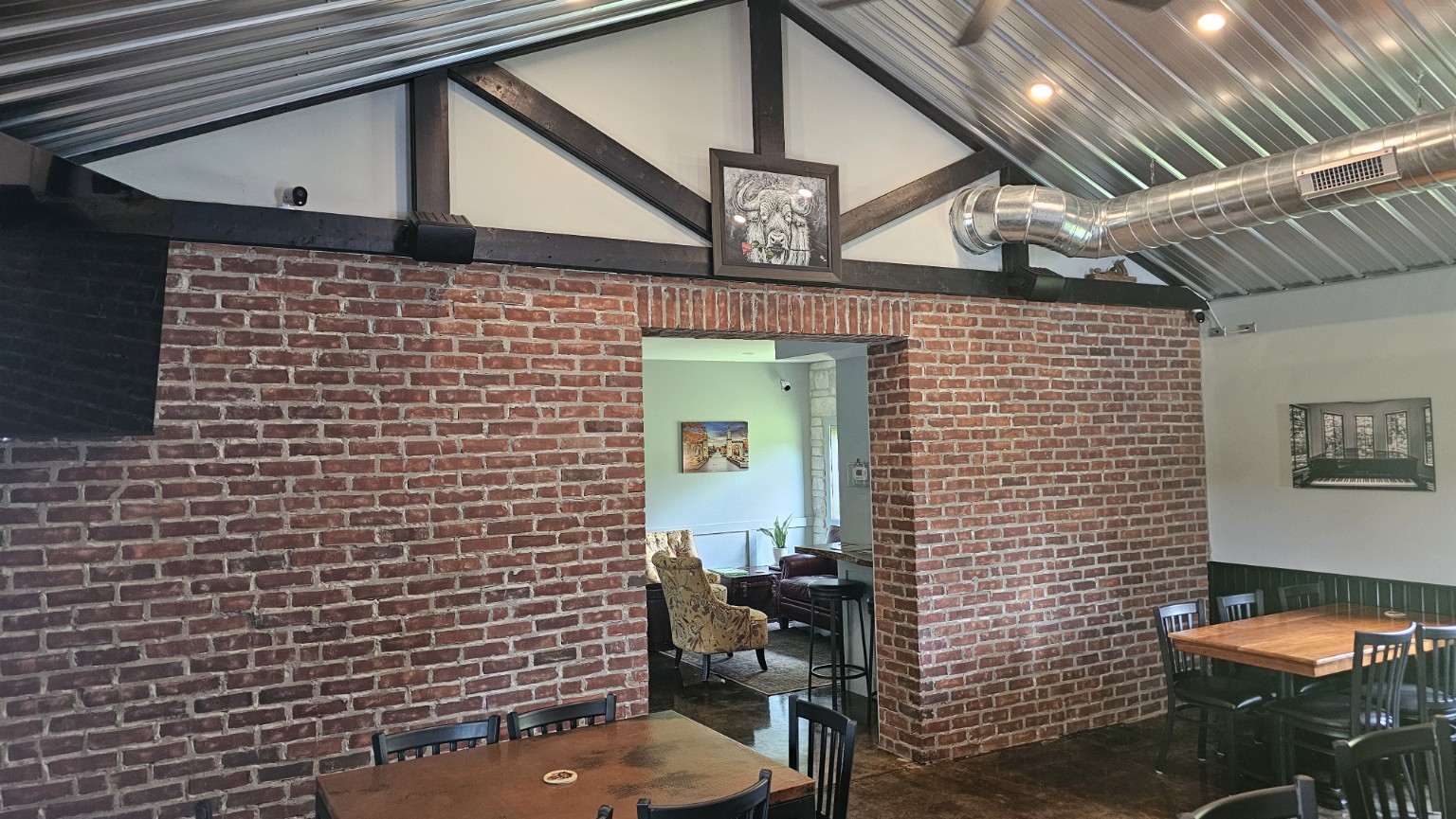Finished exposed brick interior at The Sip after remodeling